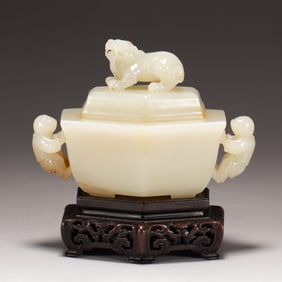 A CARVED WHITE JADE CENSER WITH COVER