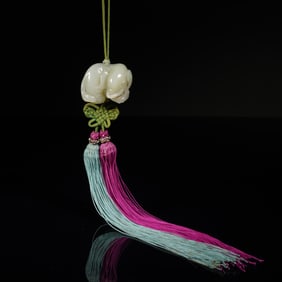 A CARVED WHITE JADE ELEPHANT