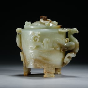 A FINE CARVED JADE VESSEL WITH COVER