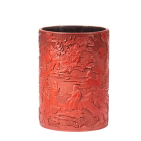 A CARVED CINNABAR LACQUER BRUSHPOT