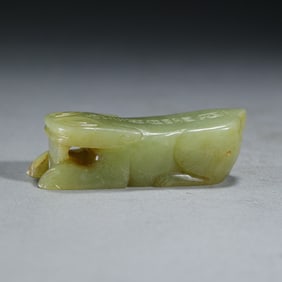 A CARVED JADE BRUSHREST