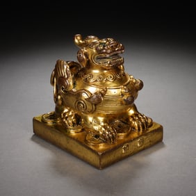 A BRONZE-GILT MYTHICAL BEAST SEAL