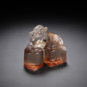 A CARVED ROCK CRYSTAL MYTHICAL BEAST SEAL