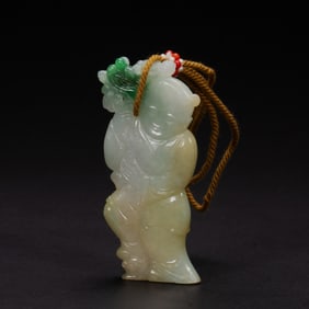 A CARVED JADEITE BOY