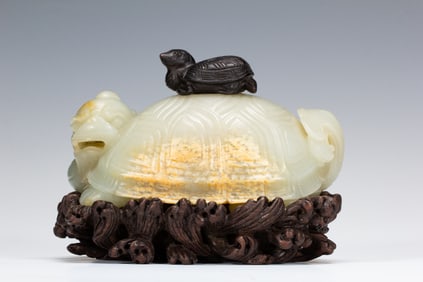 A CARVED JADE TORTOISE