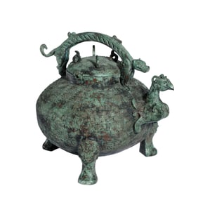 A RARE BRONZE MYTHICAL BIRD EWER HE WITH COVER