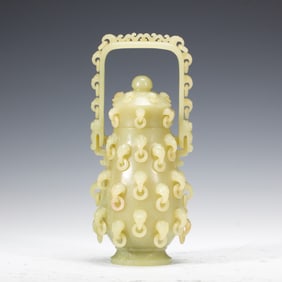 A CARVED YELLOW JADE VESSEL HU WITH COVER