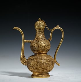 A BRONZE-GILT DOUBLE GROUDS EWER