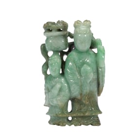 A CARVED JADEITE IMMORTAL MAGU