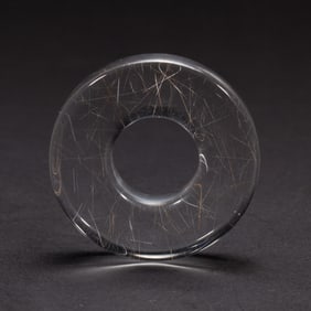 A ROCK CRYSTAL CIRCULAR DISC HUAN
