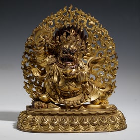 A BRONZE-GILT STANDING BEGTSE CHEN