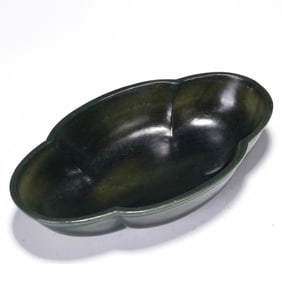A CARVED SPINACH GREEN JADE JARDINIERE