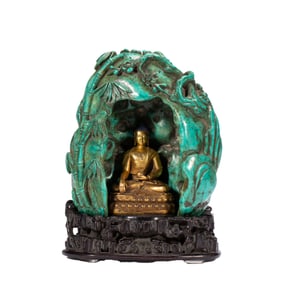 A BRONZE-GILT SEATED SHAKYAMUNI WITH TURQUOISE SHRINE