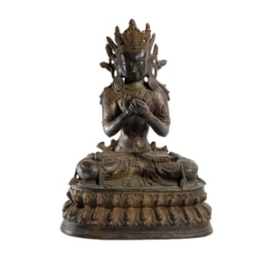 A BRONZE SEATED MAITREYA