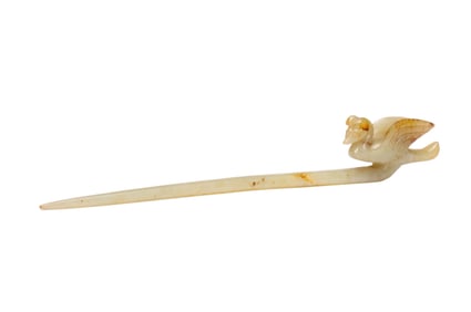 A CARVED WHITE JADE HAIRPIN