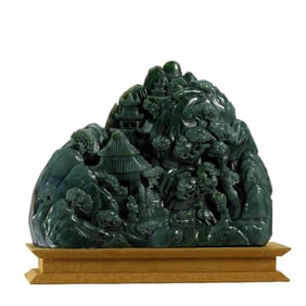 A FINE CARVED SPINACH GREEN JADE DECORATION