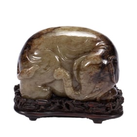 A CARVED JADE ELEPHANT
