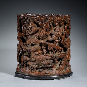 A CARVED HUANGHUALI BRUSHPOT
