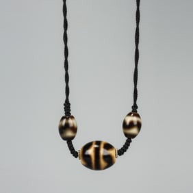 A DZI BEADS NECKLACE