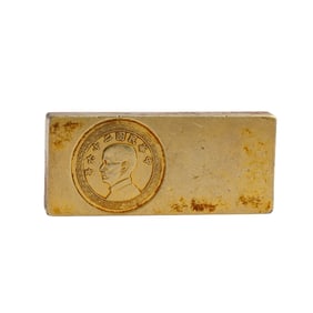 A SILVER-GILT UN-CUT COIN