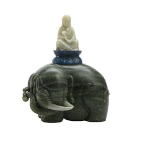 A FINE CARVED JADE GUANYIN ON ELEPHANT