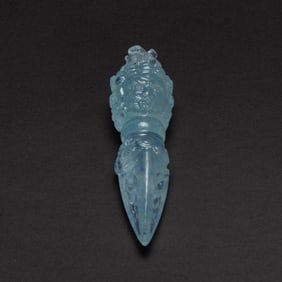 A CARVED TOURMALINE LIKE PHURBA