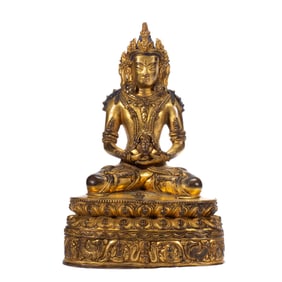 A BRONZE-GILT SEATED AMITAYUS