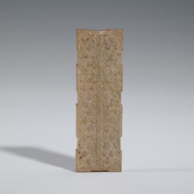 A CHINESE ARCHAISTIC JADE ORNAMENT
