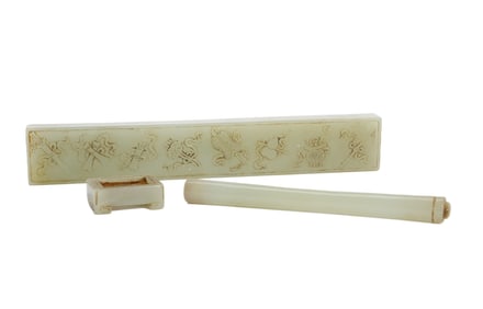 A SET OF THREE CARVED WHITE JADE LITERATI ITEMS