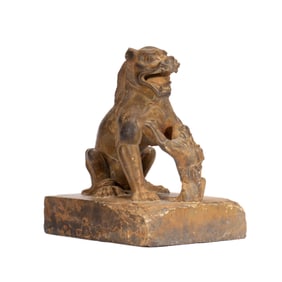 A CARVED STONES FELINE