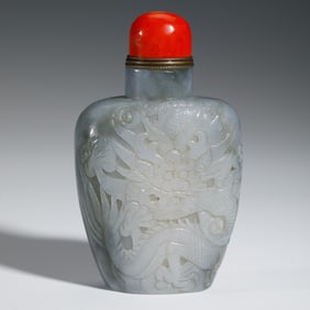 A CARVED WHITE JADE DRAGON SNUFF BOTTLE