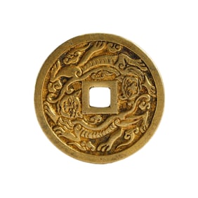 A SILVER-GILT DRAGON COIN