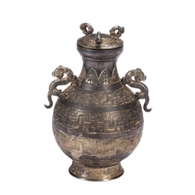 A CHINESE ARCHAISTIC SILVER WINE VESSEL HU