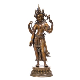 A SILVER INLAID COPPER ALLOY AVALOKITESVARA