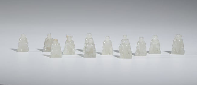 A SET OF CARVED WHTIE JADE TWELVE ZODIAC ANIMALS