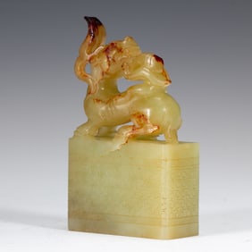 A CARVED YELLOW JADE MYTHICAL BEAST SEAL