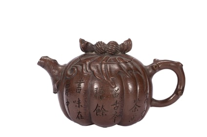 A YIXING GLAZE ZISHA TEAPOT