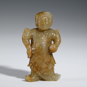A CARVED JADE GUARDIAN