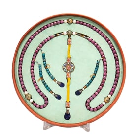 A CHINESE IMPERIAL RUBY LIKE ROSARY CHAOZHU