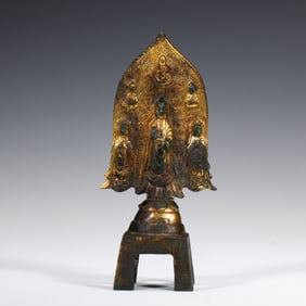A BRONZE-GILT VOTIVE GROUP BUDDHA