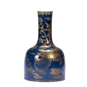 A BLUE GLAZE AND GILE PHOENIX MALLET VASE