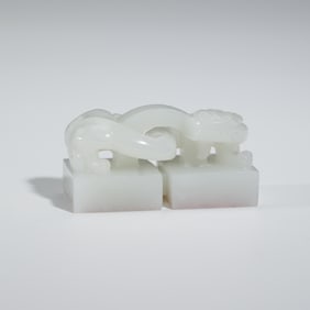 A CARVED WHITE JADE CHILONG SEAL