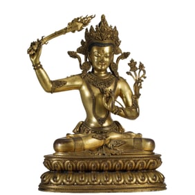 A BRONZE-GILT MANJUSRI