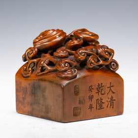 A CARVED AND INSCRIBED ALOES-WOOD LINGZHI SEAL