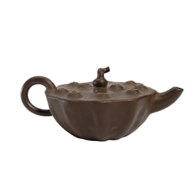 A YIXING GLAZE ZISHA TEAPOT