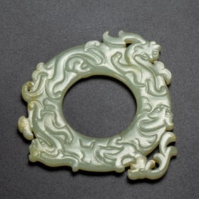 A FINE CARVED JADE CHILONG DISC