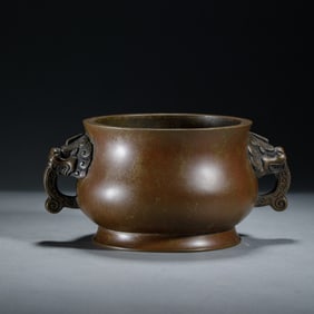 A BRONZE BOMBE CENSER WITH COVER