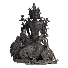 A BRONZE FIGURE OF GUANYIN