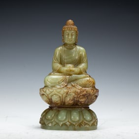 A CARVED JADE SEATED AMITABHA