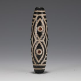 A TIBETAN HARDSTONES INLAID DZI BEAD